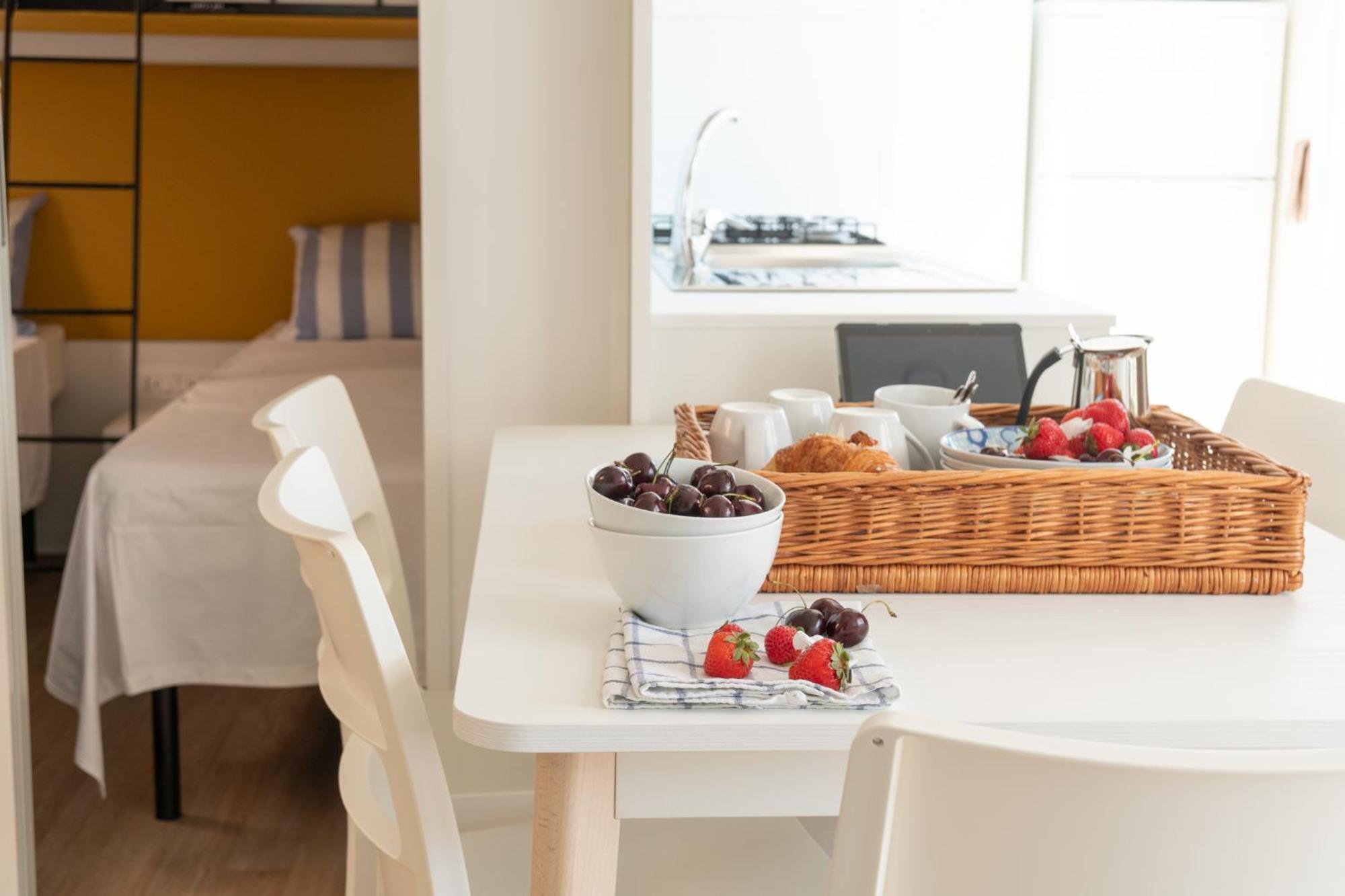 Campeggio Europa Silvella サン・フェリーチェ・デル・ベナーコ エクステリア 写真 A breakfast table